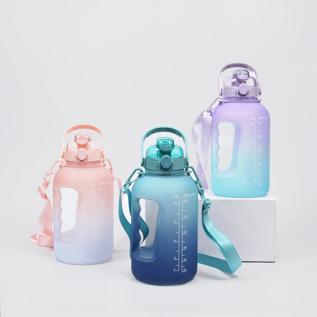 Sportive Lives GYM Bottle P150 – 1500ML large-capacity sports water bottles in Salmon & White, Purple & Cyan, and Navy & Blue, perfect for gym, yoga, and outdoor activities with ergonomic handle and shoulder strap for easy carrying.