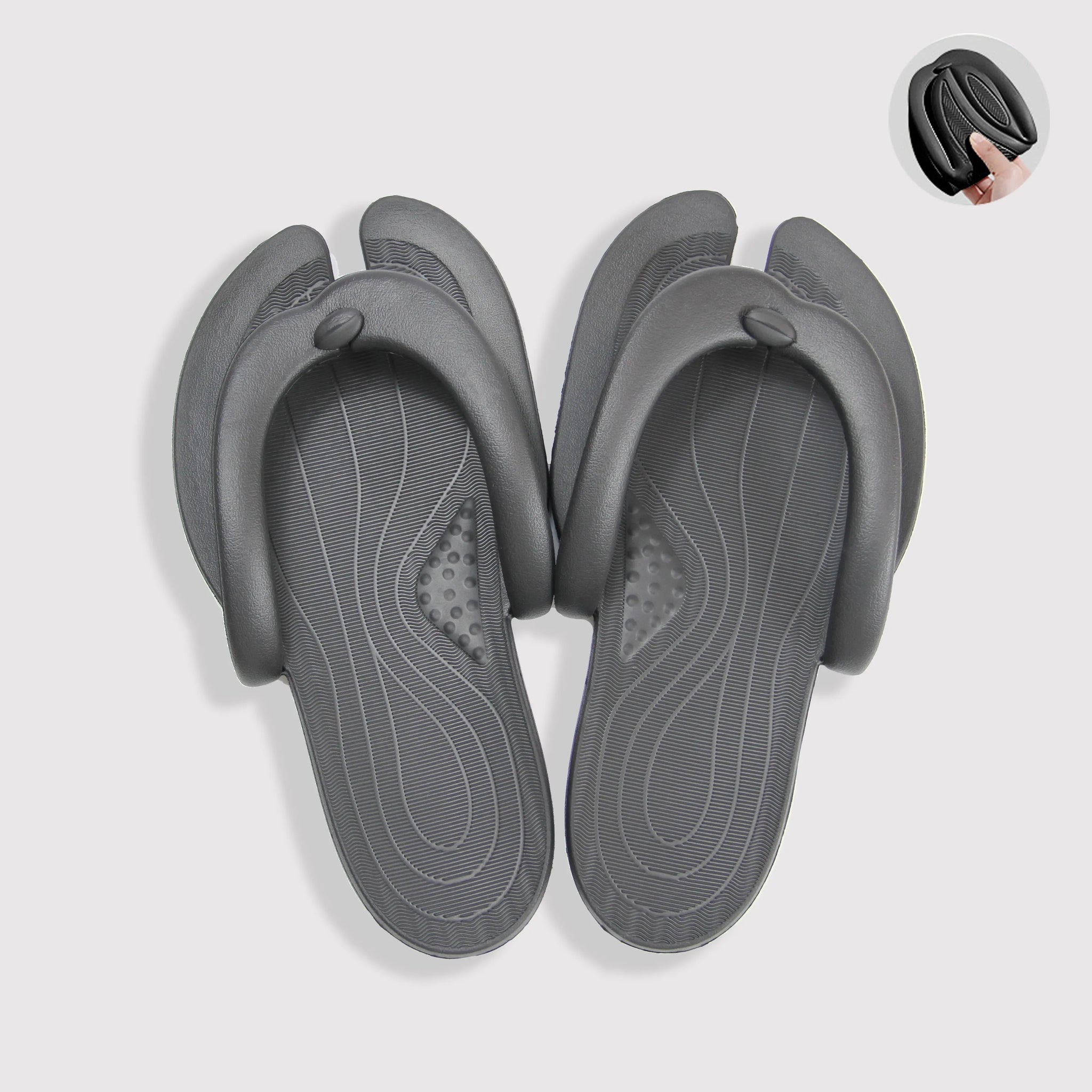 Black foldable yoga slippers, durable and compact for easy transport and storage. Available at Sportive Lives in Canada.