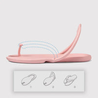 Pink foldable yoga slippers with a demonstration of how they fold for easy storage and portability. Perfect for yoga and casual wear.