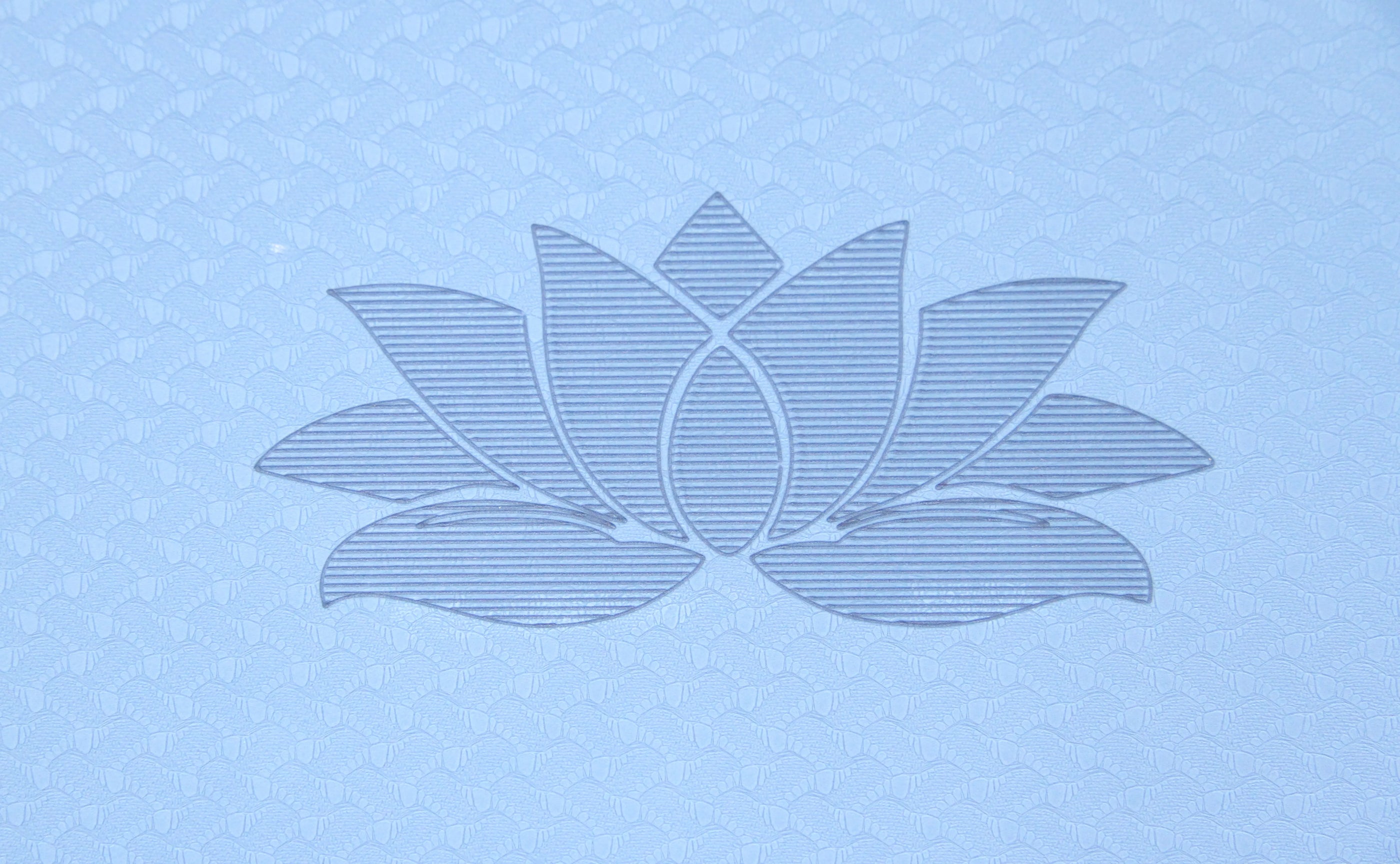 Close-up of the central lotus flower design on the Sportive Lives Yoga Mat LOTUS, providing a calming focal point for yoga practitioners in Canada.